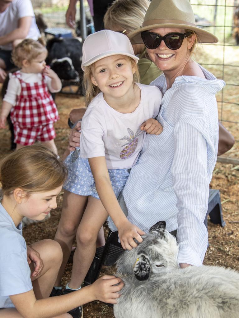 (from left) Frankie, Sunny and Tammy Mann at the Animal Nursery. Toowoomba Royal Show. Friday, March 31, 2023. Picture: Nev Madsen.