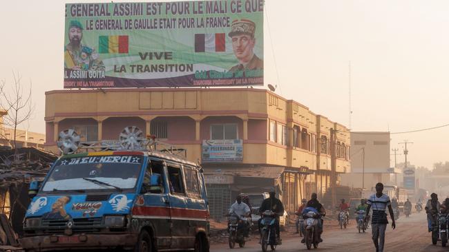 A billboard reading “General Assimi is for Mali what General de Gaulle was for France” on a street in Bamako on November 1. The billboard makes reference to Mali's interim president Assimi Goita and former French president General Charles de Gaulle. Picture: AFP