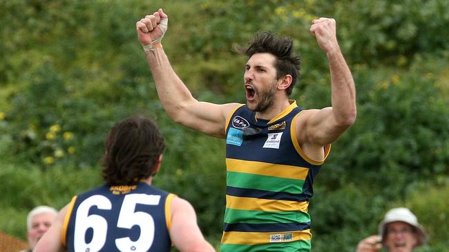 Former AFL star Jarrad Waite nails a goal for St Kevin’s. Picture: Hamish Blair