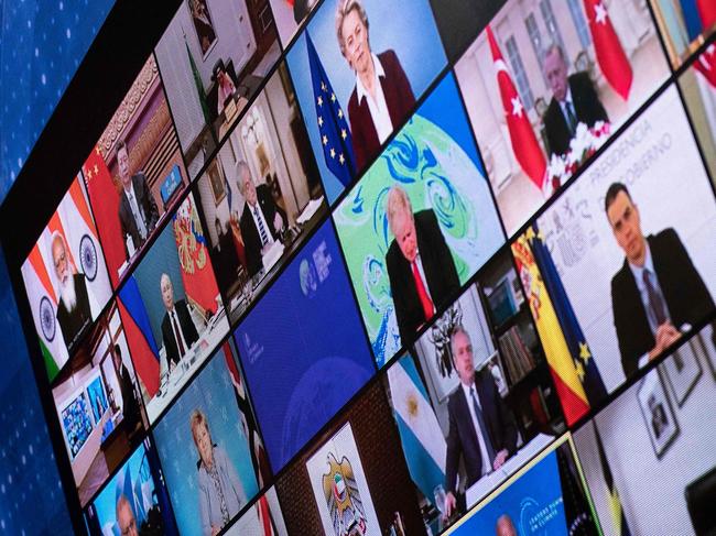 World leaders are seen on a screen during a climate change virtual summit. Picture: AFP