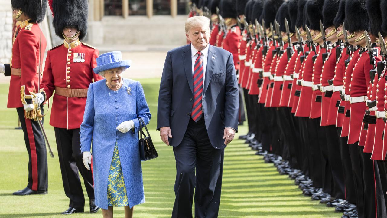 Queen Elizabeth and Mr Trump inspect a Guard of Honour, formed of the Coldstream Guards at Windsor Castle in 2018 in Windsor. Picture: Richard Pohle / WPA Pool/Getty Images