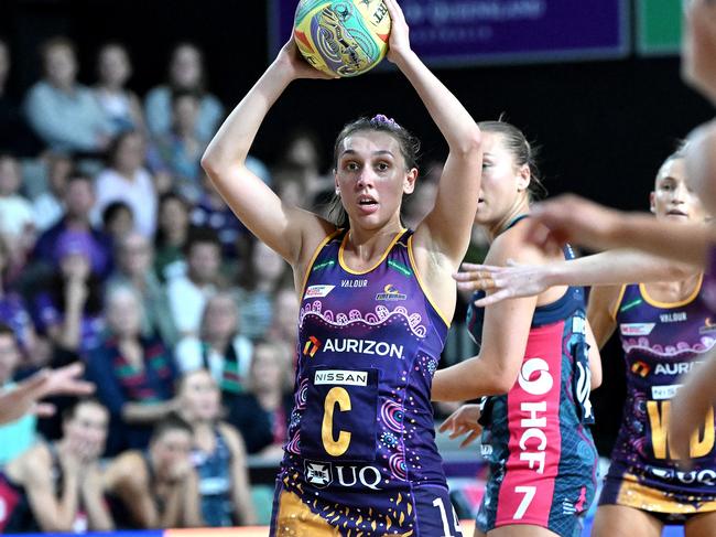 BRISBANE, AUSTRALIA - JUNE 04: Leesa Mi Mi of the Firebirds looks to pass during the round 12 Super Netball match between Queensland Firebirds and Melbourne Vixens at Nissan Arena, on June 04, 2023, in Brisbane, Australia. (Photo by Bradley Kanaris/Getty Images)