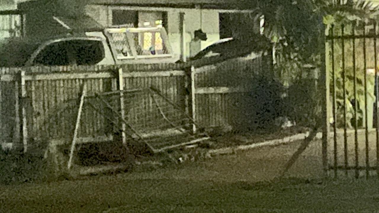 Police rammed down a fence in a dramatic arrest in Townsville on Tuesday night.