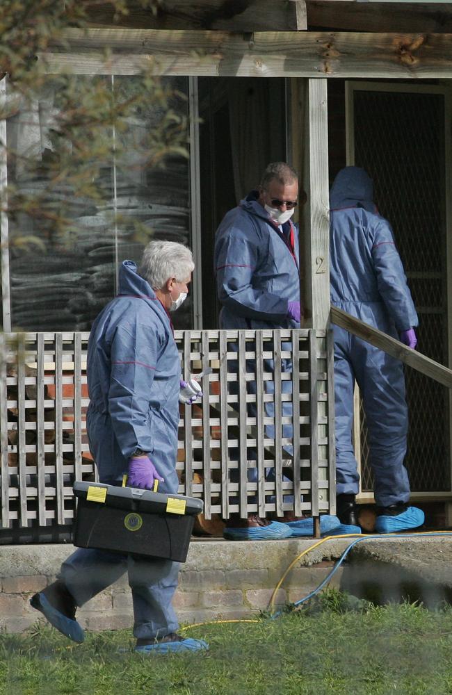 Tasmania Police forensic officers at the scene of Mr Barker’s death, August 3, 2009. Picture: File