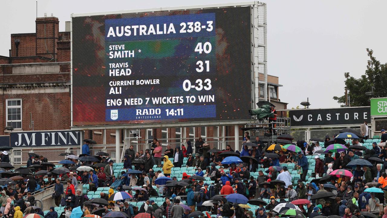 Rain has stopped play at The Oval. (Photo by Adrian DENNIS / AFP)