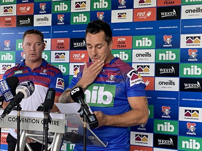 Mitchell Pearce reads a statement.