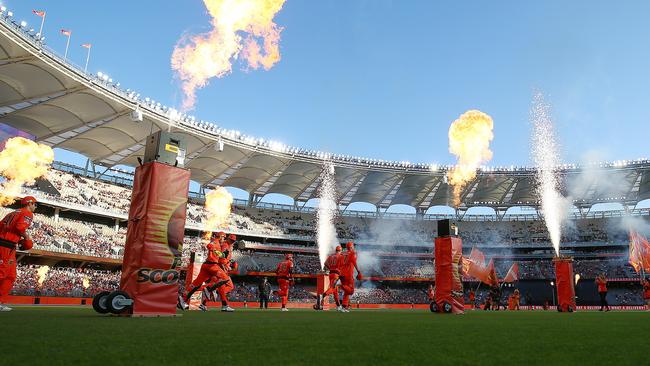 The Perth Scorchers players enter the field of play during the Big Bash League (BBL) cricket match between the Perth Scorchers and Adelaide Strikers at Optus Stadium in Perth, Friday, January 24, 2020. (AAP Image/Gary Day) NO ARCHIVING, EDITORIAL USE ONLY, IMAGES TO BE USED FOR NEWS REPORTING PURPOSES ONLY, NO COMMERCIAL USE WHATSOEVER, NO USE IN BOOKS WITHOUT PRIOR WRITTEN CONSENT FROM AAP