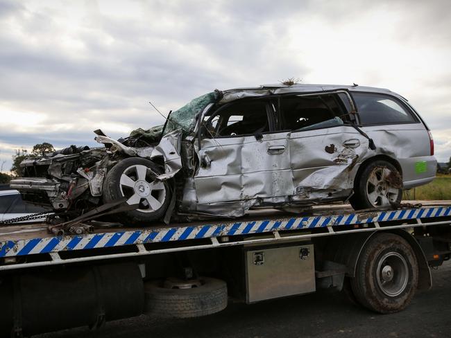 The crumpled wreck on the stationwagon lies on a trailer. Picture: Lindsay Moller