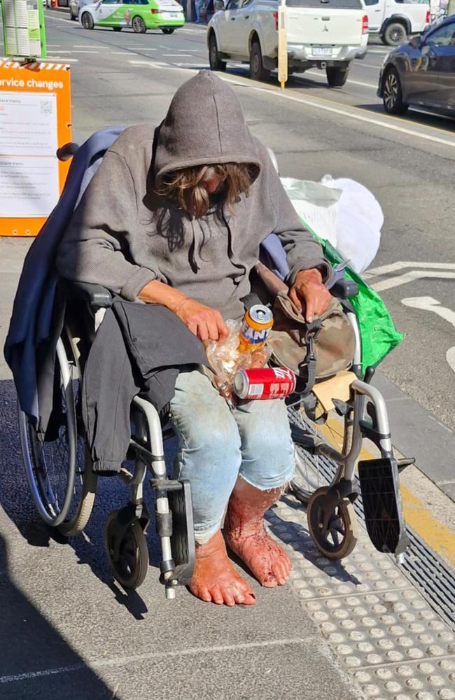 A drug user pictured in North Richmond this week was unconscious by the side of Victoria Street. Picture: News.com.au