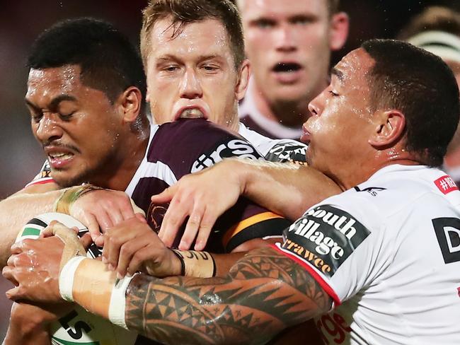 SYDNEY, AUSTRALIA - MARCH 08:  Anthony Milford of the Broncos is tackled during the round one NRL match between the St George Illawarra Dragons and the Brisbane Broncos at UOW Jubilee Oval on March 8, 2018 in Sydney, Australia.  (Photo by Matt King/Getty Images)