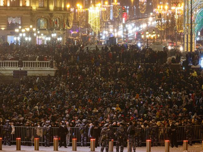 People gather near the Red Square to celebrate. Picture: AFP