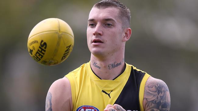 Dustin Martin walked away from a press conference after he didn’t want to answer questions about his contract. Picture: Wayne Ludbey