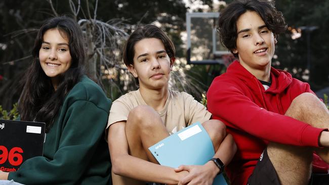 Isabella Bonnici, 16, with her brothers Sam, 14, and Milan, 16. Picture: Jonathan Ng