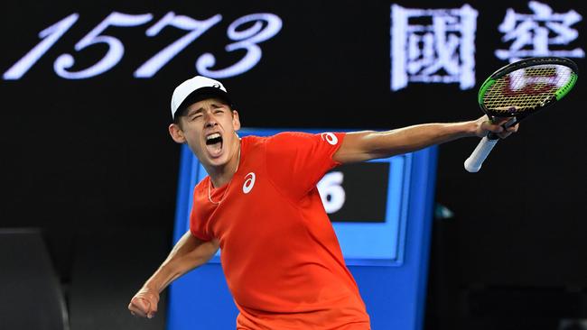 Australia's Alex de Minaur celebrates his victory against Switzerland's Henri Laaksonen during their men's singles match on day three of the Australian Open tennis tournament in Melbourne on January 16, 2019. (Photo by Paul Crock / AFP) / -- IMAGE RESTRICTED TO EDITORIAL USE - STRICTLY NO COMMERCIAL USE --