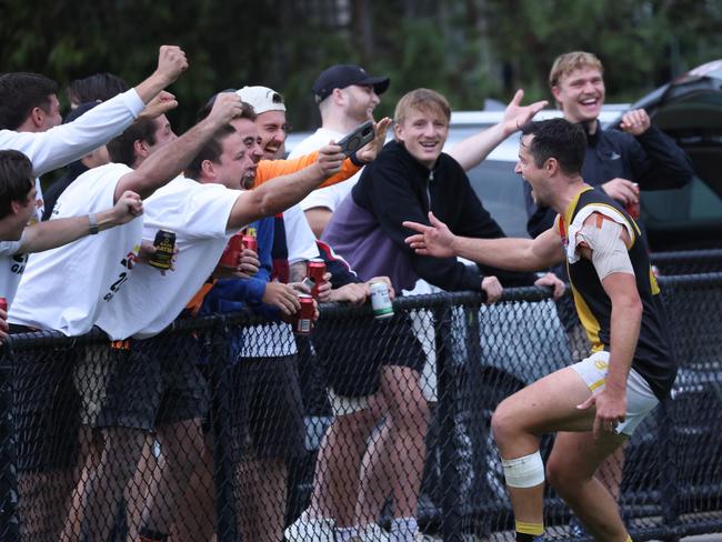 ... and he celebrates it with his mates too. Picture: Andrew Keech.