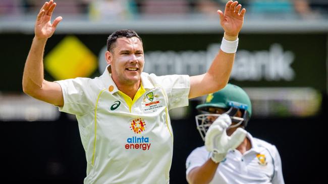 Scott Boland celebrates after taking the wicket of South Africa's Marco Jansen in the first cricket Test.