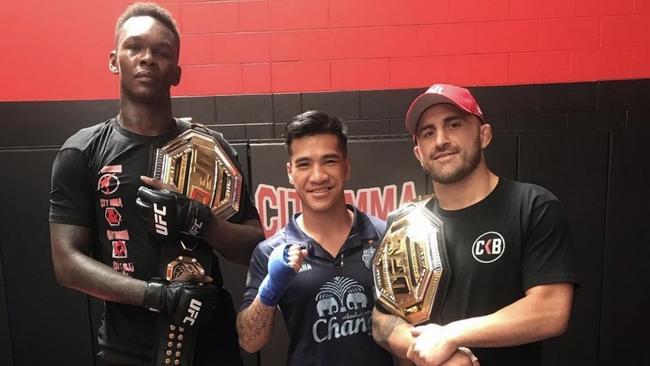 Nort Beauchamp (centre) trains alongside Israel Adesanya and Alexander Volkanovski.