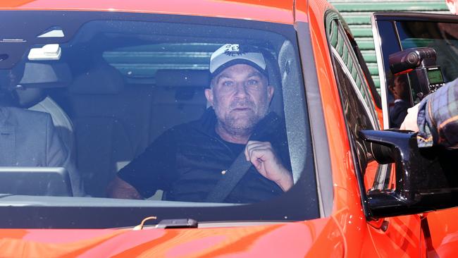 Slater leaving Manly Police Station in a luxury BMW 4WD. Picture: Richard Dobson