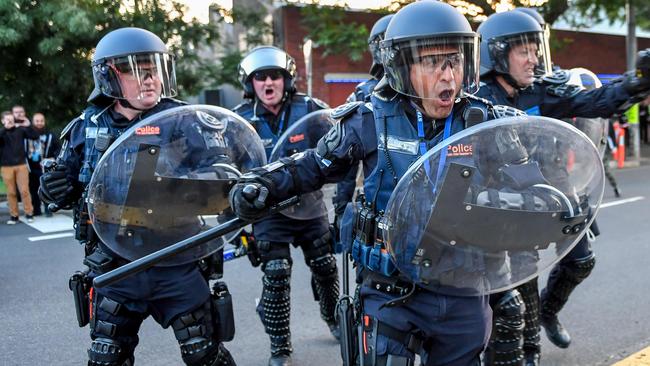 Police in riot gear during the wild demonstrations outside of a Milo Yiannopoulos show in Melbourne. Picture: Jake Nowakowski