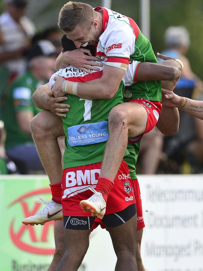 Pat Templeman embraces Edene Gebbie after he scores the match winning try in the prelim final against Townsville. Picture: Matt Taylor