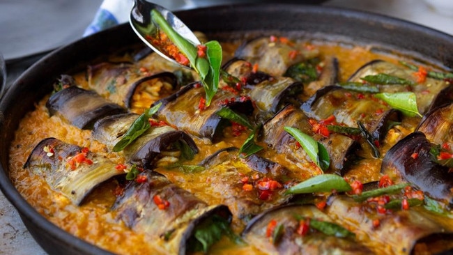 Stuffed eggplant in curry and coconut dal. Picture: Jonathan Lovekin