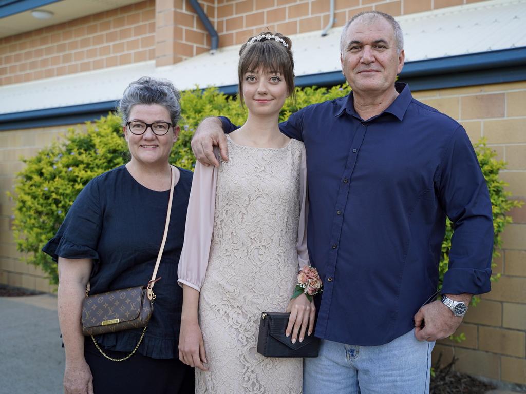 Chrisse and Enrico Favini with daughter Rosanna Favini at the Mackay North State High School formal at Windmill Function Centre, November 19, 2021. Picture: Heidi Petith