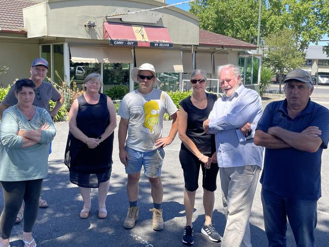 Violet St, Bendigo residents are opposing a developer's plan to build a new Guzman y Gomez next to their homes. Left to right: Jennifer Campbell, Tim Jenkyn, Cindy Smith, Chris Corr, Heather Rohde, Michael Rohde, Colin Campbell. Picture: Gianni Francis.