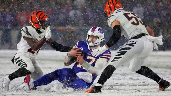 Bengals players close in on Buffalo quarterback Josh Allen. Picture: Getty Images