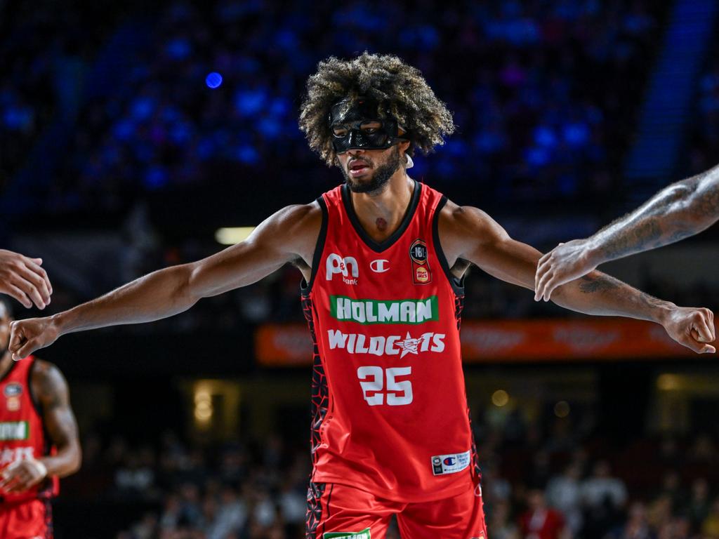 Keanu Pinder of the Wildcats celebrates a point during the win. Picture: Getty