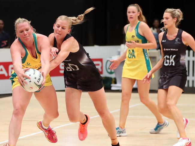 Caitlin Thwaites and Katrina Grant do battle during the last Netball Quad Series.