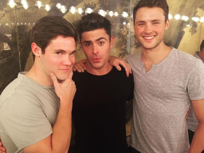 Zac Efron poses with his brother Dyland and actor Adam Devine. Picture: Instagram