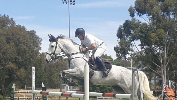 Jump joy: Russell Hearn riding RBH Dante at the Northern Victorian Showjumping Club.