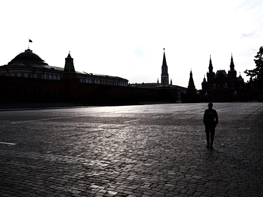 A policeman patrols an empty Red Square in Moscow after the failed uprising. Picture: AFP