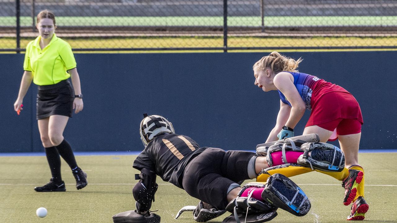 Toowoomba keeper Sarah Steinhardt and Talicia Canty, Brisbane. Toowoomba 1 vs Brisbane. Hockey Queensland Championship at Clyde Park, Toowoomba. Saturday, May 1, 2021. Picture: Nev Madsen.