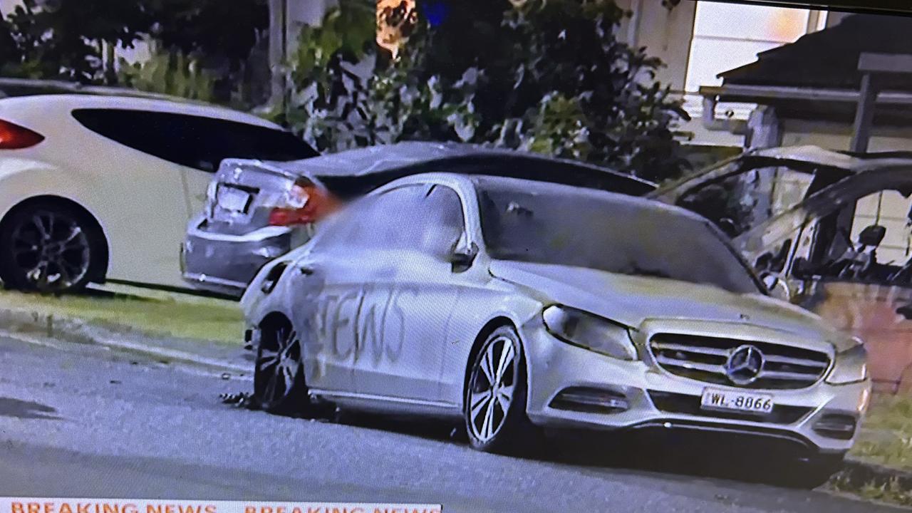 Cars torched, hate messages sprayed in affluent Sydney suburb