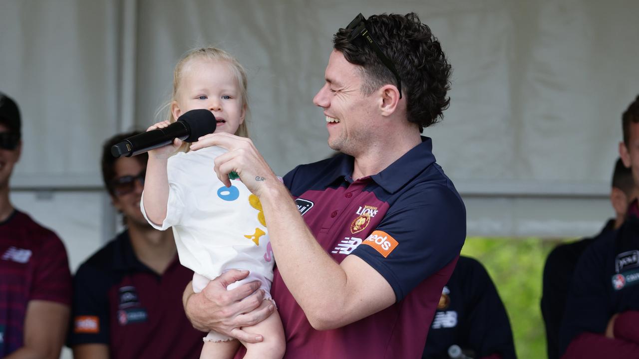 Piper stole the show as dad declared Brisbane will be back in 2024. Picture: Lachie Millard