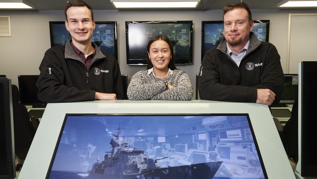 Engineers Ethan Beaumont, Sian Hardie, and Tom Hodge in the future combat system lab at SAAB at Mawson Lakes. The company is preparing to recruit for more jobs. Picture: Matt Loxton