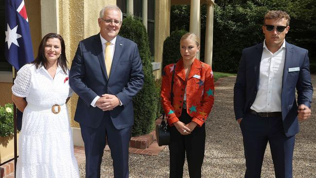 Prime Minister Scott Morrison and wife Jenny during an awkward encounter with outgoing Australian of the Year Grace Tame and her fiance at The Lodge in Canberra. Picture: NCA NewsWire / Gary Ramage