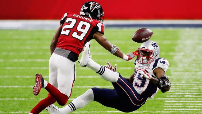 C.J. Goodwin of the Falcons breaks up a pass intended for Malcolm Mitchell. Picture: Getty