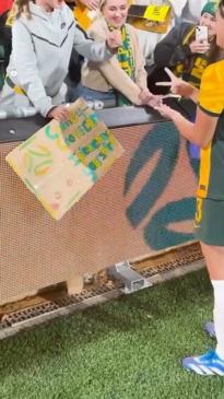 Matildas fan asks player for game of Scissors Paper Rock for her shirt