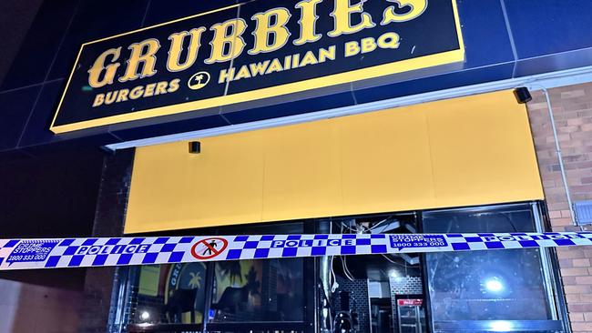 Police at the scene of an arson attack overnight at Grubbies Burgers &amp; Hawaiian BBQ at Redbank Plains.