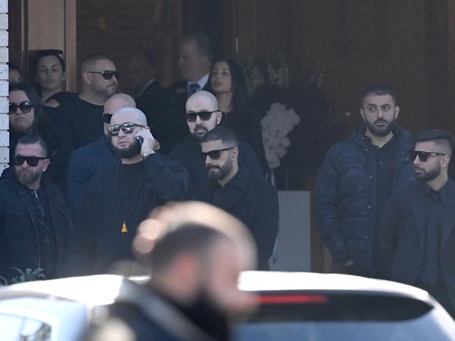 Mourners gather at the funeral of Alen Moradian at Greenfield Park on Wednesday.