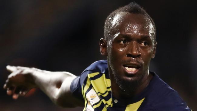 Usain Bolt of the Mariners celebrates scoring his first goal during the pre-season friendly match against Macarthur South West United. Picture: Getty Images