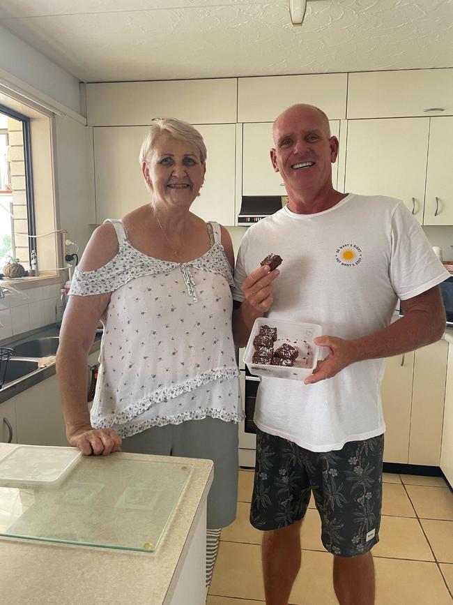 Councillor Jason OPrey with his mother in law Margie Poole and her famous chocolate slice.