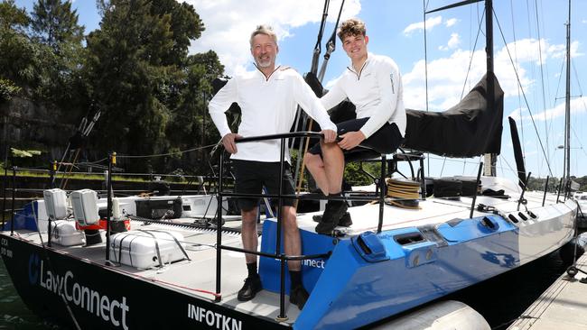 Law Connect Skipper Christian Beck and his son Indy (17) on board their yacht that won line honours in last years Sydney-Hobart race. Picture: Jane Dempster