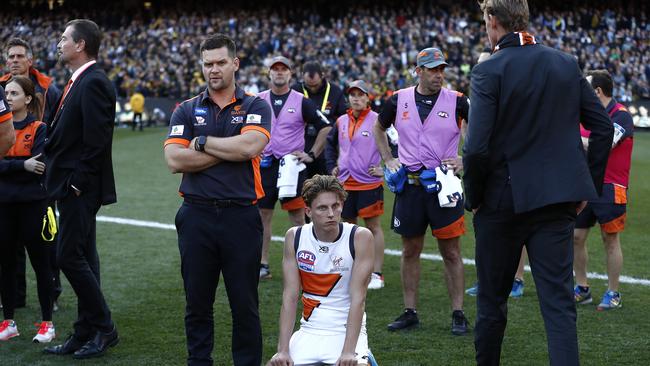 GWS star Lachie Whitfield slumps to the ground after the final siren. Picture: Ryan Pierse/AFL Media/via Getty Images.