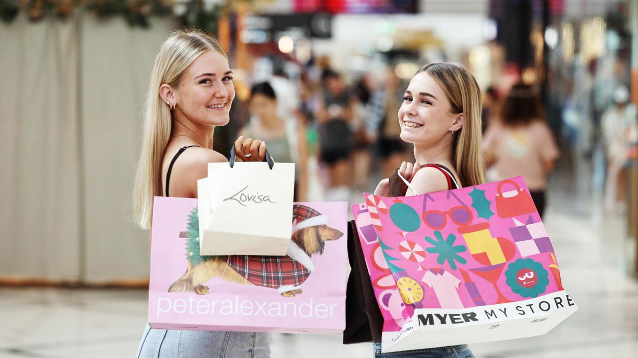 Scarlett Shannon and Kiara Dowch shop up a storm at Cairns Central Shopping Centre. Picture: Brendan Radke