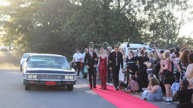 Emma Langley, Luke Mennis &amp; Josh Wein arrived in a Chevy Impala to the 2023 Gin Gin State High School Formal.