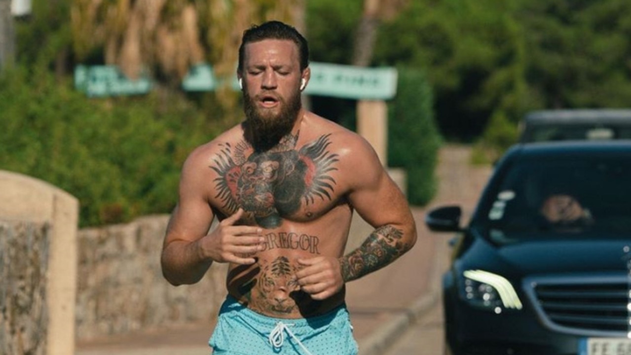 Conor McGregor has been pictured on a topless run on holiday in Corsica