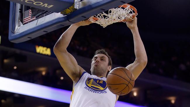 Bogut dunks the ball against Denver.